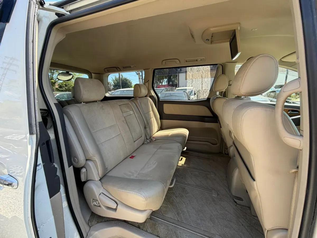 Toyota Alphard белый — фото 10