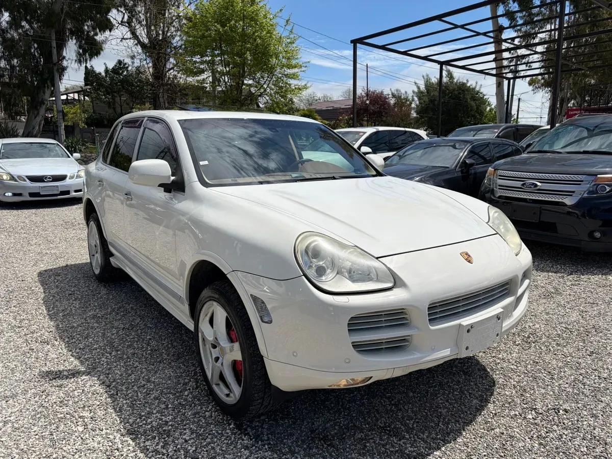 Porsche Cayenne белый — фото 1
