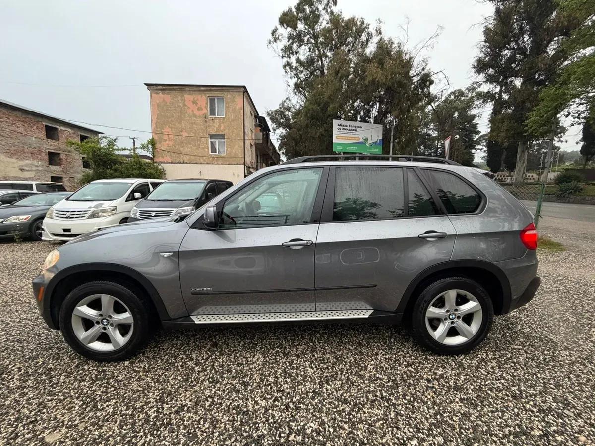 BMW X5 мокрый асфальт — фото 4