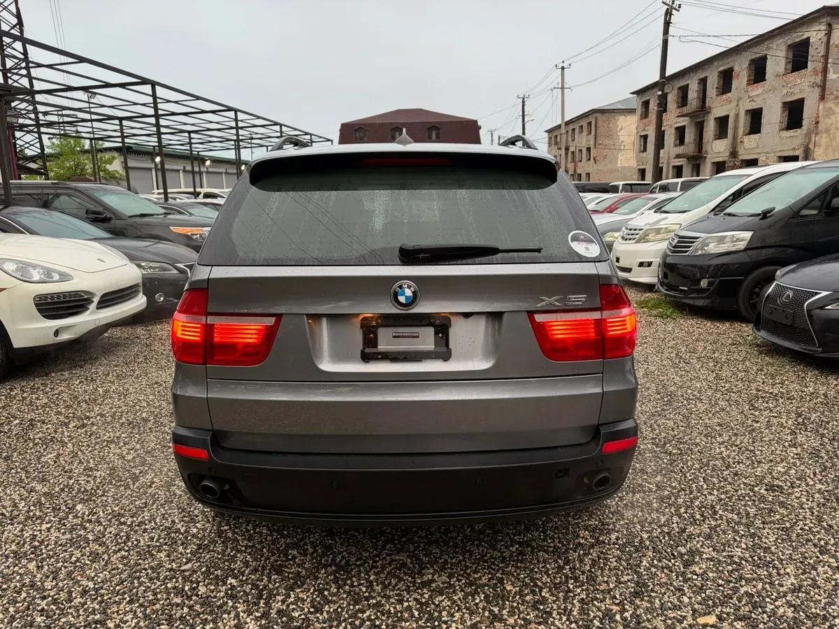 BMW X5 мокрый асфальт — фото 8